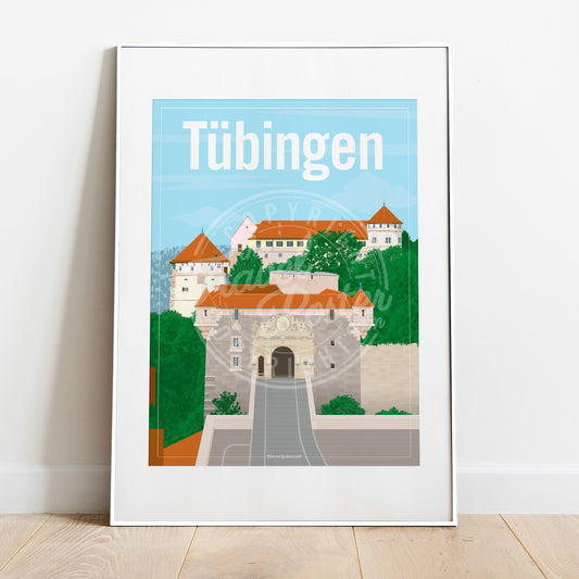 a frame with a poster of the Hohentübingen Castle, placed on a parquet floor resting against a white wall