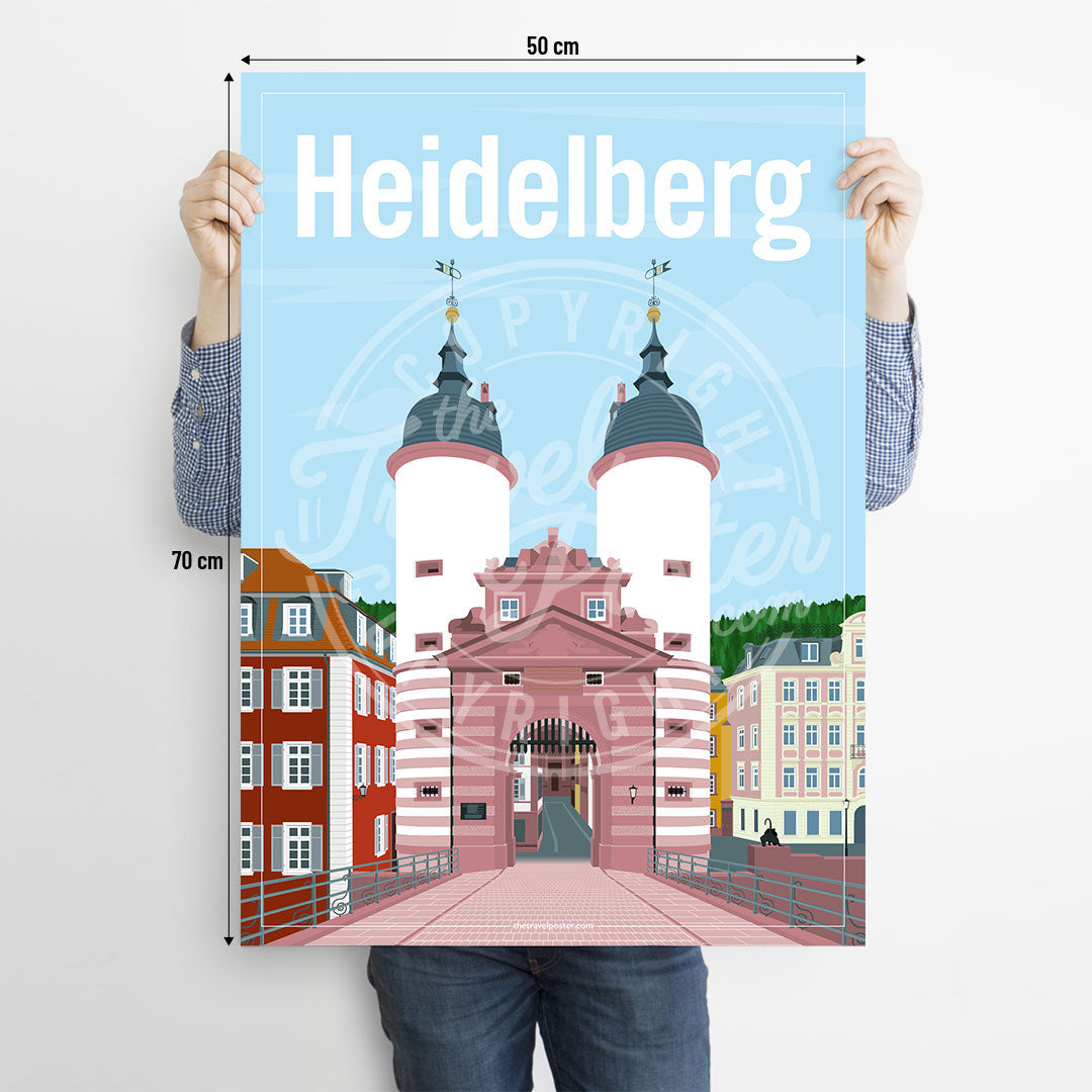 A man holding a poster of the Heidelberg Bridge Gate on a white background