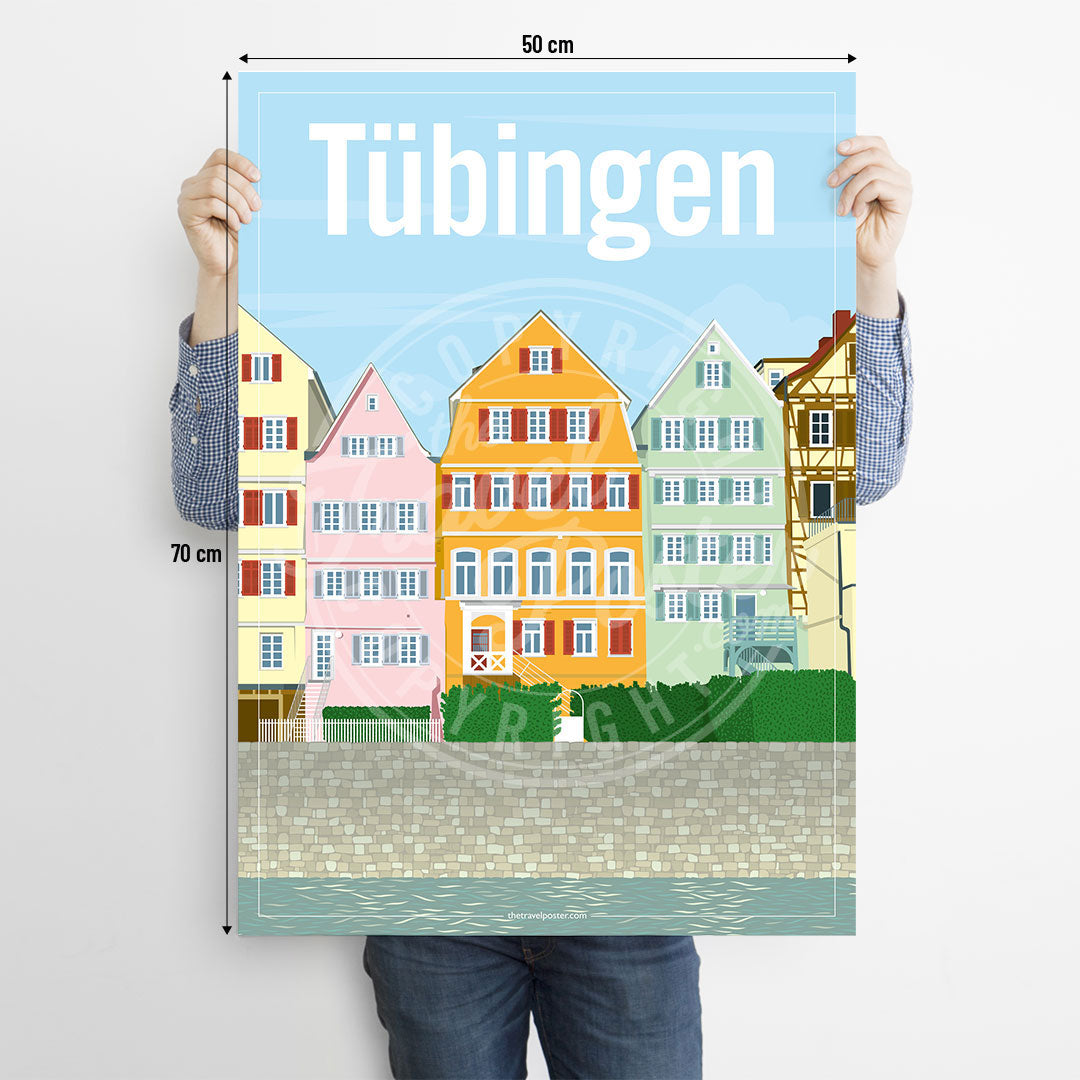 A man holding a poster of the Neckar riverfront in Tübingen on a white background