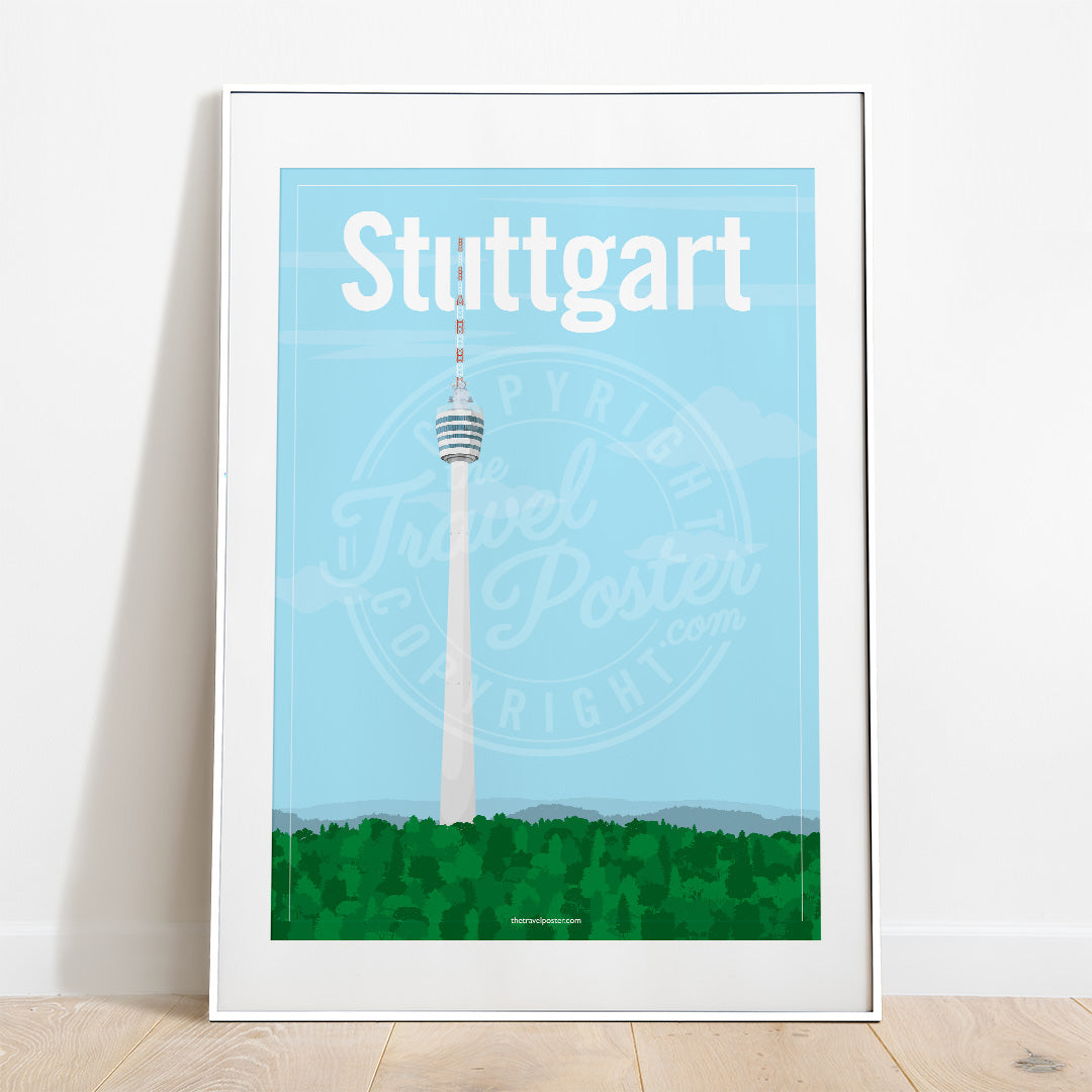 a frame with a poster of the Stuttgart TV Tower, placed on a parquet floor resting against a white wall
