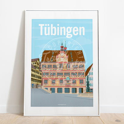 a frame with a poster of the Tübingen Rathaus, placed on a parquet floor resting against a white wall