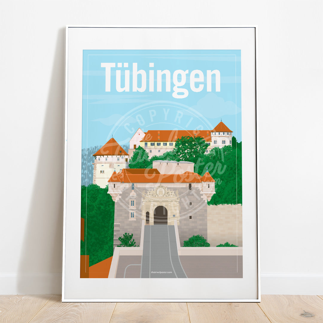 a frame with a poster of the Hohentübingen Castle, placed on a parquet floor resting against a white wall